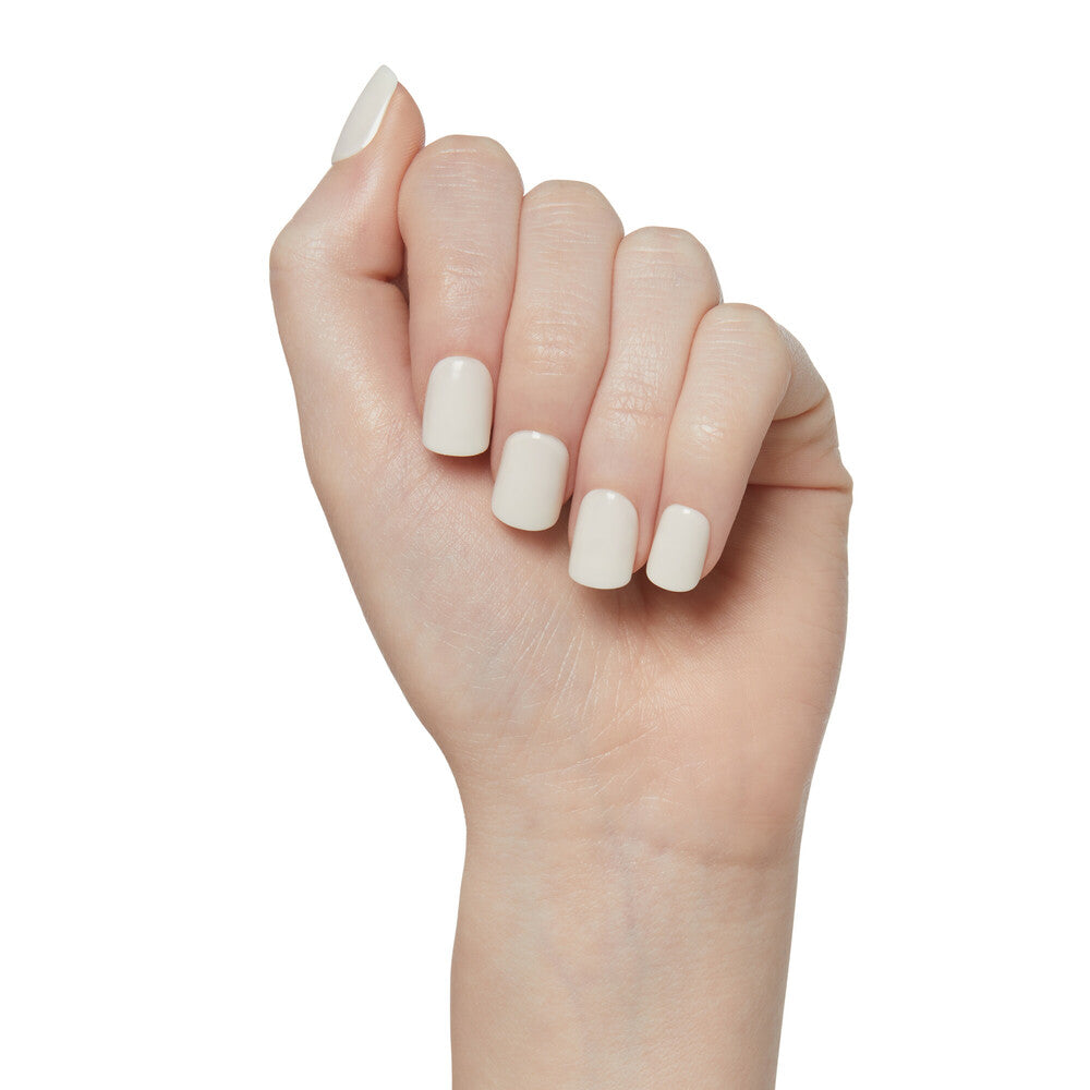 IMC29Y2_extra_002 "KISS imPRESS Color Press-On Nails – Solid Color Shades, Short Squoval, shown on bare hand."