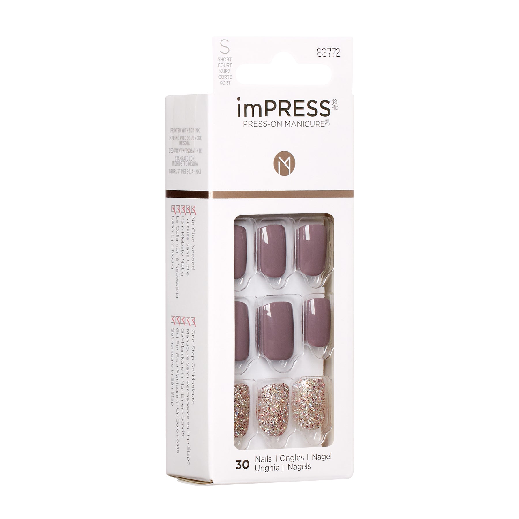 KIM011C_extra_005 "A package of imPRESS Press-On Manicure nails. The packaging is predominantly white with a clear window displaying the nails inside. The set includes 30 nails in total. The nails are in two different styles: a solid mauve color and a glittery gold design. The brand name "imPRESS" is prominently displayed at the top of the package, along with the phrase "Press-On Manicure." The packaging also includes some text on the side, likely instructions or additional product information."